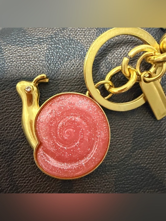 The Unbranded Brand Accessories - Gold-Tone Snail Keychain with Sparkling Pink Enamel /Llavero Caracol 🐌 charm Bag